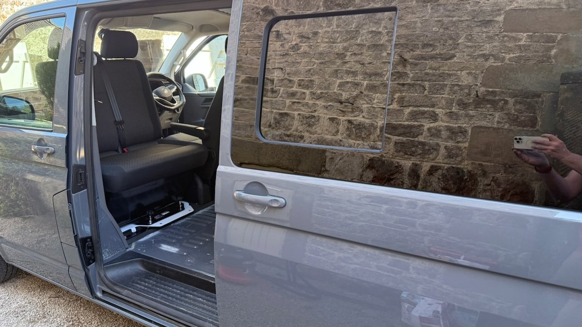 ZomB Build 001 — fitted side window and passenger seat swivel base on a 2023 VW Transporter T6.1