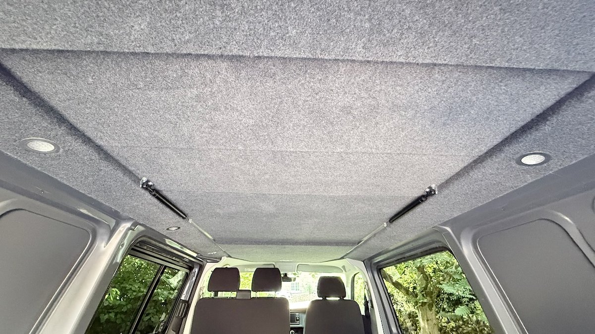 ZomB Build 001 — interior with ceiling lining, spot lights and pop top gas struts visible